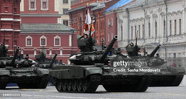 Russian T-90 tanks take part in the Victory Day Parade at Red Square on May 9, 2012 in Moscow, Russia. Over 14,000 servicemen took part in the annual...