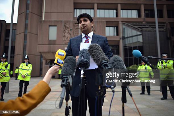 Lawyer Alias Yusaf talks to the media outside Liverpool Crown Court after the sentencing of nine men in the Rochdale child exploitation case on May...