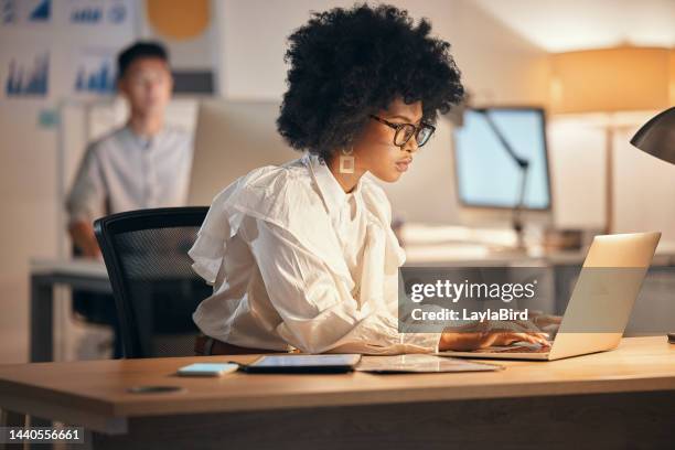 laptop, typing and business black woman with digital marketing research, analytics analysis or copywriting at global company. advertising agency, finance and data seo writer on multimedia website app - search engine optimisation stockfoto's en -beelden