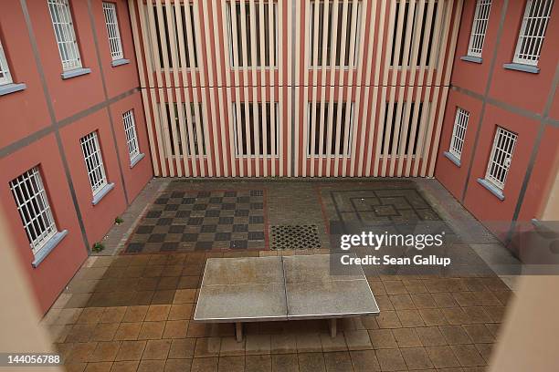 Ping pong table stands in the courtyard of the expanded youth arrest facility in Lichtenrade district on May 9, 2012 in Berlin, Germany. The...