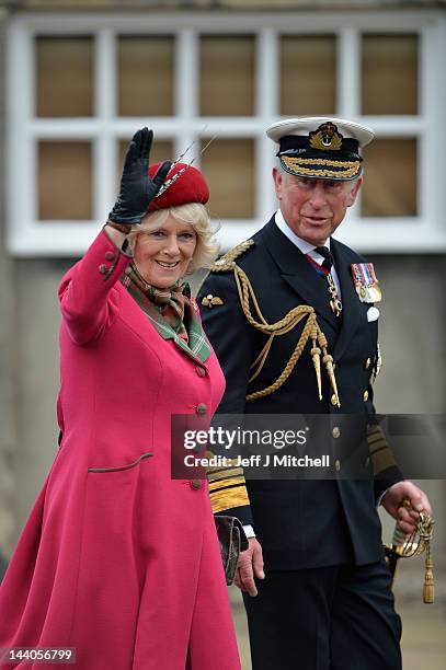 The Duke and Duchess of Rothesay wave to members of the public after taking a royal salute from Armed Forces and Royal British Legion members, at the...