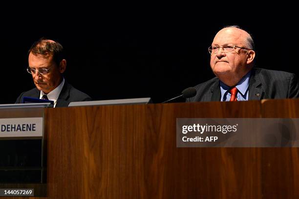 French-Belgian bank Dexia's chairman Jean-Luc Dehaene and Dexia's CEO Pierre Mariani attend a general ordinary meeting on May 9, 2012 in Brussels....