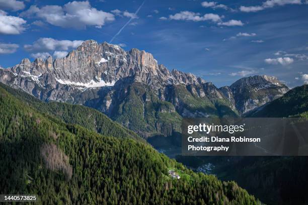 view of the dolomites near colle santa lucia in the province of belluno in the italian region of veneto - colle santa lucia stock pictures, royalty-free photos & images