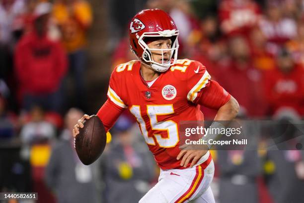 Patrick Mahomes of the Kansas City Chiefs scrambles against the Tennessee Titans at GEHA Field at Arrowhead Stadium on November 6, 2022 in Kansas...