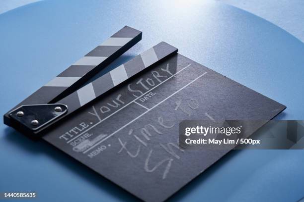 clapper board with text your story time to share - story telling in the workplace stock pictures, royalty-free photos & images