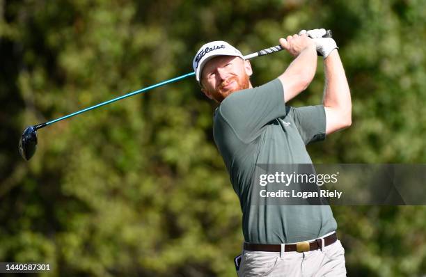 Anders Albertson of the United States plays his shot from the 14th tee during the first round of the Cadence Bank Houston Open at Memorial Park Golf...