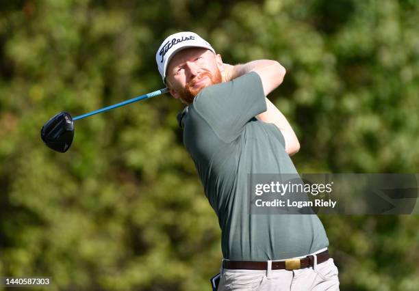 Anders Albertson of the United States plays his shot from the 14th tee during the first round of the Cadence Bank Houston Open at Memorial Park Golf...