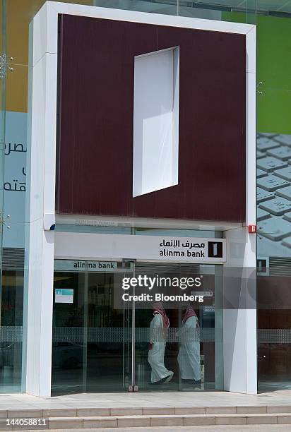 Visitors are seen inside the offices of Alinma Bank in Riyadh, Saudi Arabia, on Tuesday, May 8, 2012. Saudi Arabia's stock market is the Gulf...