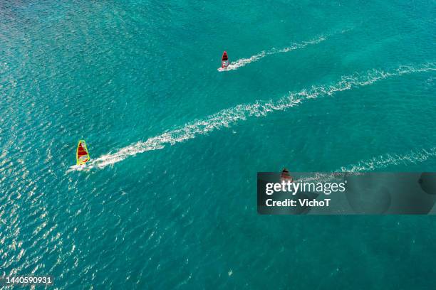 wind surfing in turquoise sea water drone view - lefkas bildbanksfoton och bilder