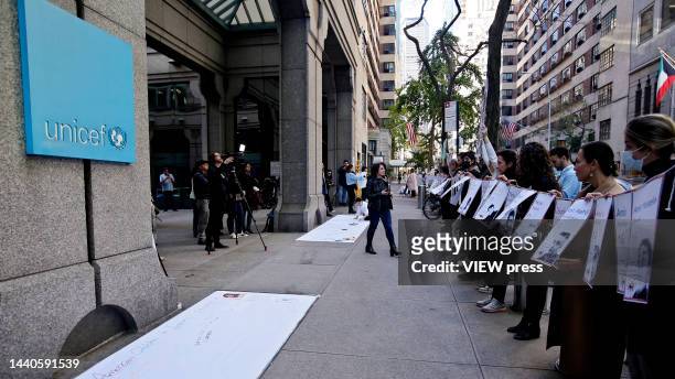 People gather to show support for children of Iran at UNICEF headquarters on November 10, 2022 in New York City. According to reports 46 children...