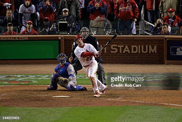 David Freese of the St. Louis Cardinals hits a walk off solo home run in the 11th inning to win Game Six of the MLB World Series against the Texas...