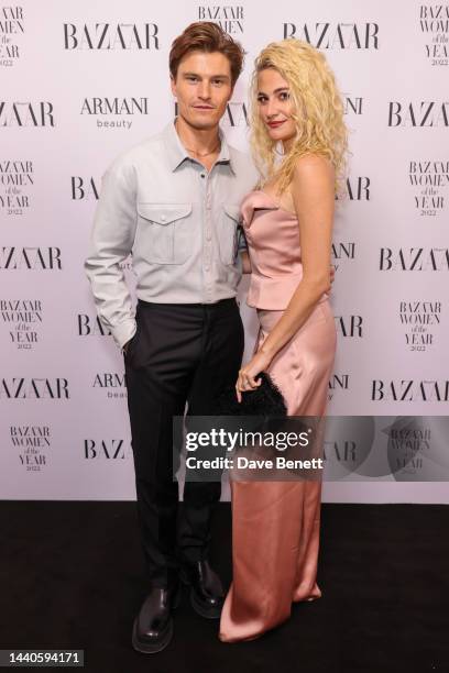Oliver Cheshire and Pixie Lott attend the Harper's Bazaar Women of the Year Awards 2022, in partnership with Armani Beauty, at Claridge's Hotel on...