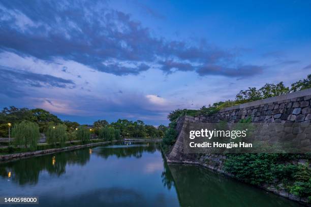 the city skyline of osaka, japan. - osaka skyline stock pictures, royalty-free photos & images