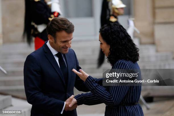 Kosovo's President Vjosa Osmani, and French President Emmanuel Macron pose at the Elysee palace as part of the Paris Peace Forum, in Paris on...