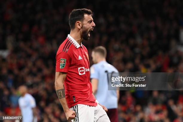 Bruno Fernandes of Manchester United celebrates their team's first goal, scored by Anthony Martial during the Carabao Cup Third Round match between...