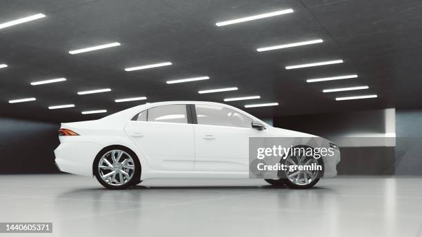 modern car in underground garage - clean car dealership stock pictures, royalty-free photos & images