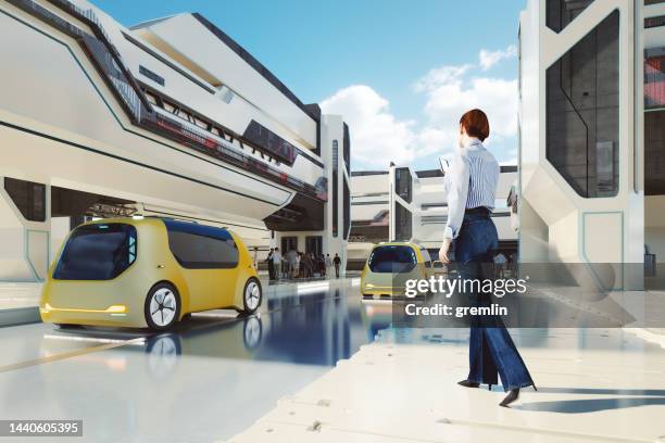 woman calling up driverless automated transport vehicle - i pace concept car stock pictures, royalty-free photos & images