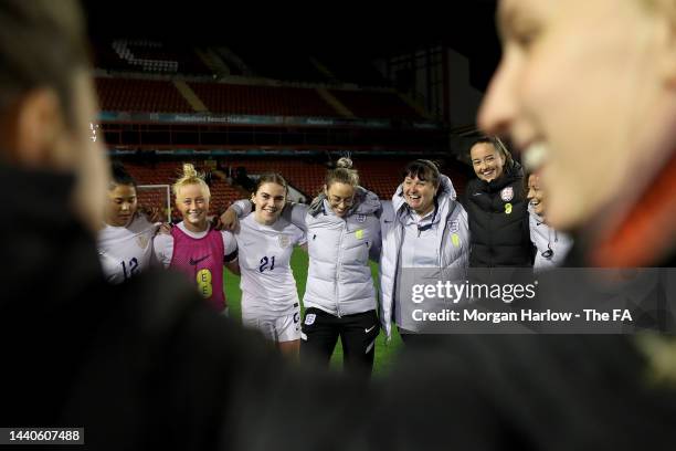 Mo Marley, Manager of England talks to players as they huddle following the WU23 International Friendly match between England Women and Netherlands...