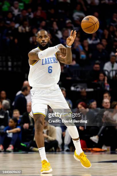 LeBron James of the Los Angeles Lakers passes the ball against the Minnesota Timberwolves in the third quarter of the game at Target Center on...