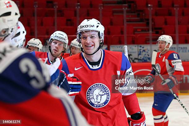 Marius Holtet of Norway celebrate with his team mates their 3rd goal during the IIHF World Championship group S match between Norway and Italy at...