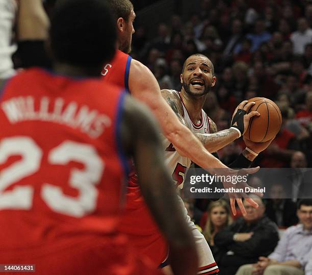 Carlos Boozer of the Chicago Bulls looks to pass against the Philadelphia 76ers in Game Five of the Eastern Conference Quarterfinals during the 2012...