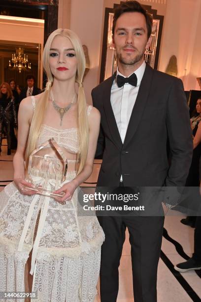 Anya Taylor-Joy, winner of the Actress award and Nicholas Hoult attend the Harper's Bazaar Women of the Year Awards 2022, in partnership with Armani...