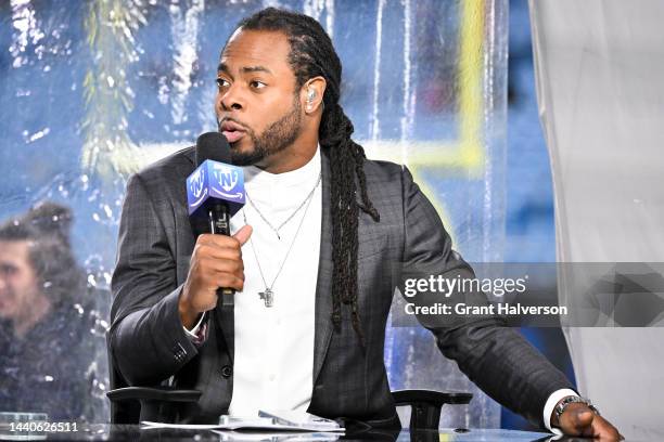 Richard Sherman talks while doing Thursday Night Football Kickoff before the Atlanta Falcons and Carolina Panthers game at Bank of America Stadium on...