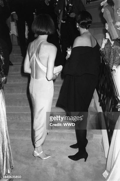 Anna Wintour and Donna Karan attending the Municipal Arts Society's dinner, co-chaired by Jacqueline Kennedy Onassis at Henri Bendel's.