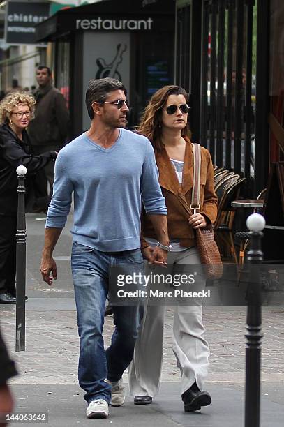 Actress Cote de Pablo and boyfriend Diego Serrano are sighted strolling on 'Rue de Rivoli' on May 9, 2012 in Paris, France.