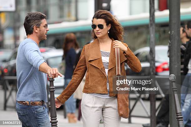 Actress Cote de Pablo and boyfriend Diego Serrano are sighted strolling on 'Rue de Rivoli' on May 9, 2012 in Paris, France.