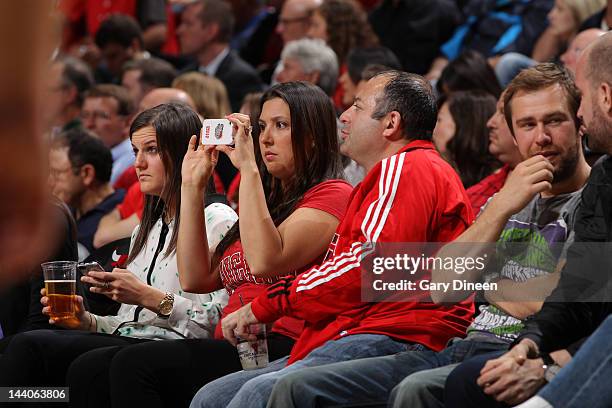 Fan using her smart phone during the Philadelphia 76ers against the Chicago Bulls in Game Five of the Eastern Conference Quarterfinals during the...