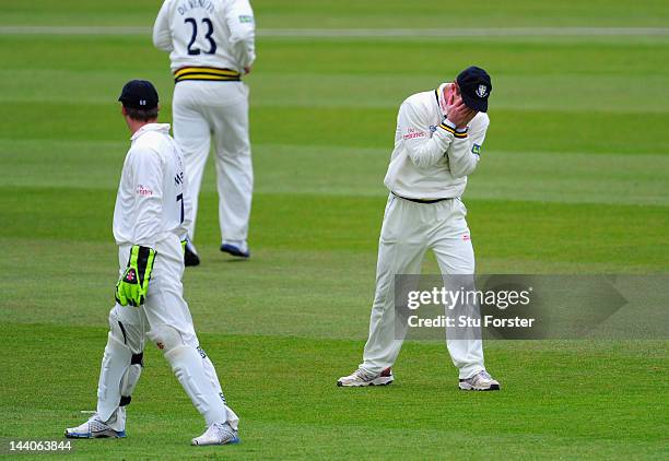 Durham fielder Paul Collingwood holds his head as another edge goes through the slips to the boundary during day one of the LV County Championship...