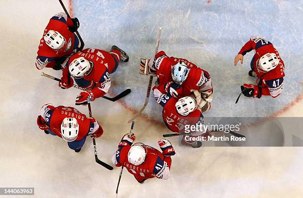 Lars Haugen , goaltender of Norway celebrate with his team mates after the IIHF World Championship group S match between Norway and Italy at Ericsson...