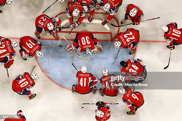 The team of Norway lines up before the IIHF World Championship group S match between Norway and Italy at Ericsson Globe on May 9, 2012 in Stockholm,...