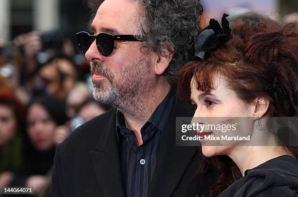 Tim Burton and Helena Bonham Carter attend the European premiere of Dark Shadows at the Empire Leicester Square on May 9, 2012 in London, England.