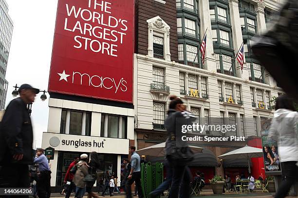 People walk in front of Macy's flagship store on May 9, 2012 in New York City. Beating Wall Street's expectations, Macy's Inc. Reported a 38 percent...