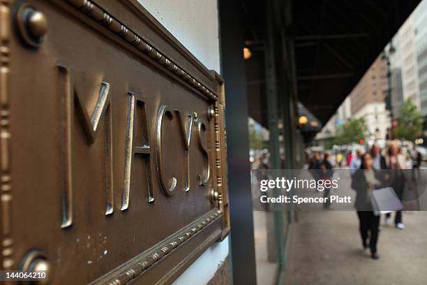 People walk in front of Macy's flagship store on May 9, 2012 in New York City. Beating Wall Street's expectations, Macy's Inc. Reported a 38 percent...