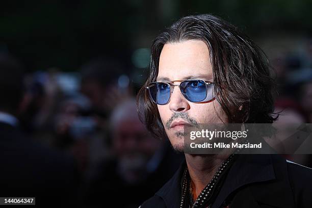 Johnny Depp attends the European premiere of Dark Shadows at Empire Leicester Square on May 9, 2012 in London, England.