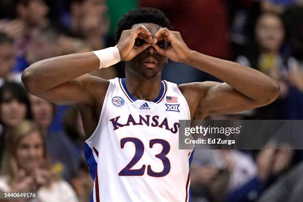 Ernest Udeh Jr. #23 of the Kansas Jayhawks celebrates a teammates' basket against the North Dakota State Bison in the second half at Allen Fieldhouse...