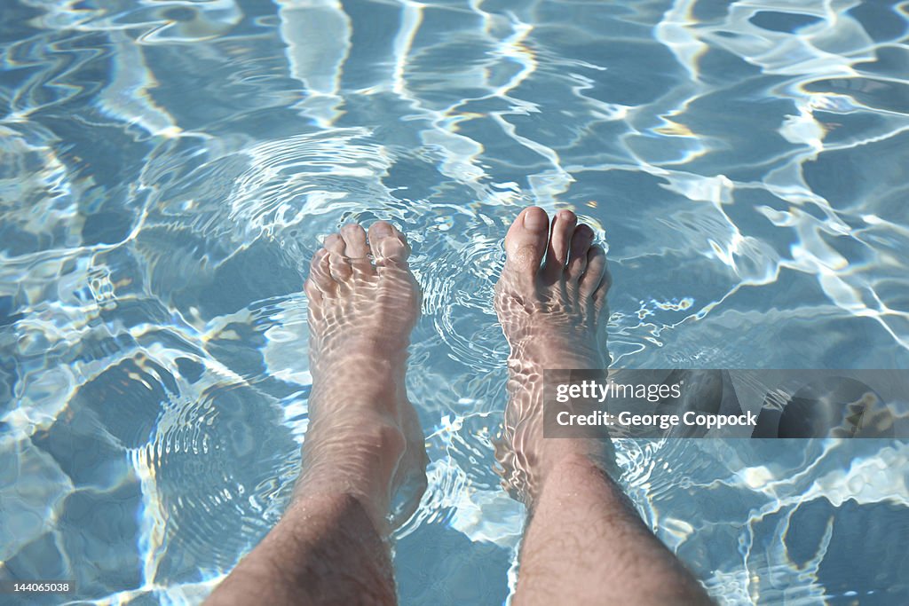 Feet in swimming pool