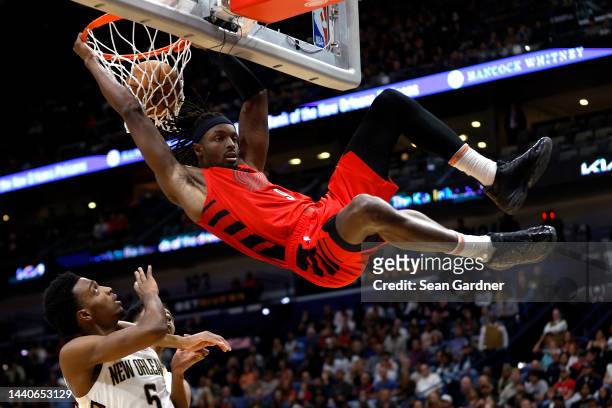 Jerami Grant of the Portland Trail Blazers dunks the ball over Herbert Jones of the New Orleans Pelicans during the fourth quarter of an NBA game at...