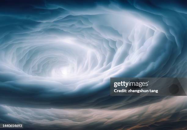 blue hole in sky surrounded by cumulus clouds - wettervorhersage stock-fotos und bilder