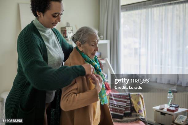 cross generational care and philanthropy in the community - family netherlands stock pictures, royalty-free photos & images