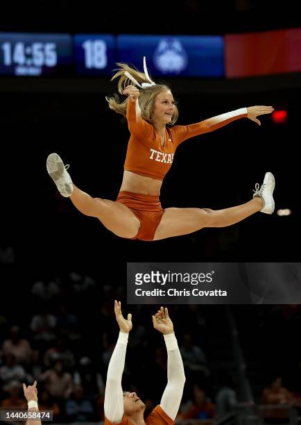 The Texas cheerleaders perform during the game between the Houston Christian Huskies and the Texas Longhorns at Moody Center on November 10, 2022 in...