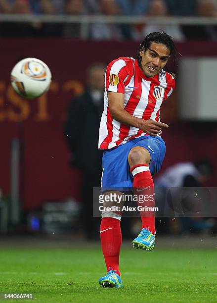 Radamel Falcao of Atletico Madrid scores the opening goal during the UEFA Europa League Final between Atletico Madrid and Athletic Bilbao at the...