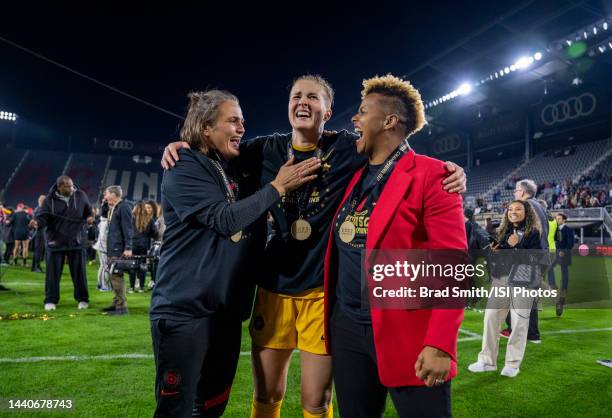 Nadine Angerer, Bella Bixby, and Karina LeBlanc of the Portland Thorns celebrate during NWSL Cup Final game between Kansas City Current and Portland...