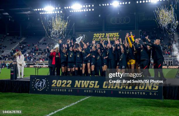 The Portland Thorns raise the NWSL trophy during NWSL Cup Final game between Kansas City Current and Portland Thorns FC at Audi Field on October 29,...