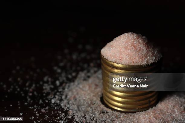 close-up of pink salt/himalayan salt in a brass bowl/still life - kitchen utensils stock pictures, royalty-free photos & images