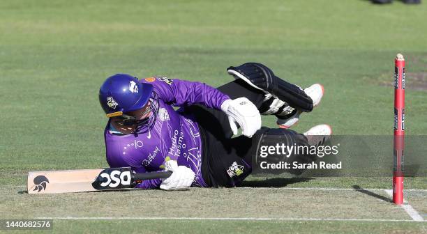 Lizelle Lee of the Hobart Hurricanes on the ground after colliding with Tegan McPharlin of the Adelaide Strikers during the Women's Big Bash League...