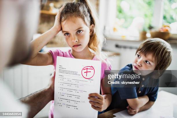 i've got an f on my test results! - child report card stock pictures, royalty-free photos & images